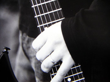 Carsten Mai - hand and guitar close-up